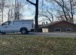 Orion Construction contractor performing roof repairs on a residential home in Northeast Ohio.